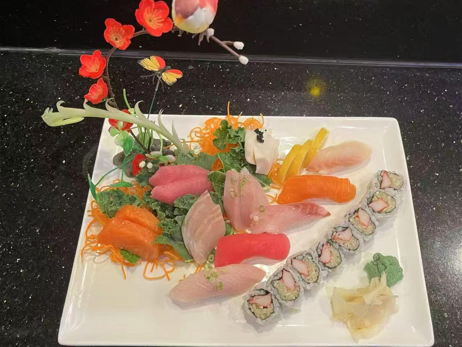 Sashimi Deluxe with California Roll at Neon Sushi, Japanese Restaurant in Schenectady Sashimi Deluxe with California Roll at Neon Sushi, Japanese Restaurant in Schenectady